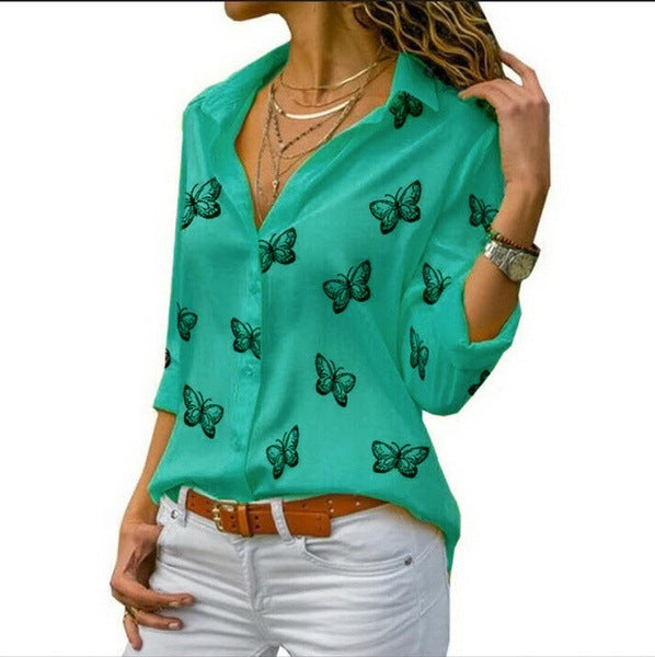 Neleia – Loose blouse with butterfly pattern