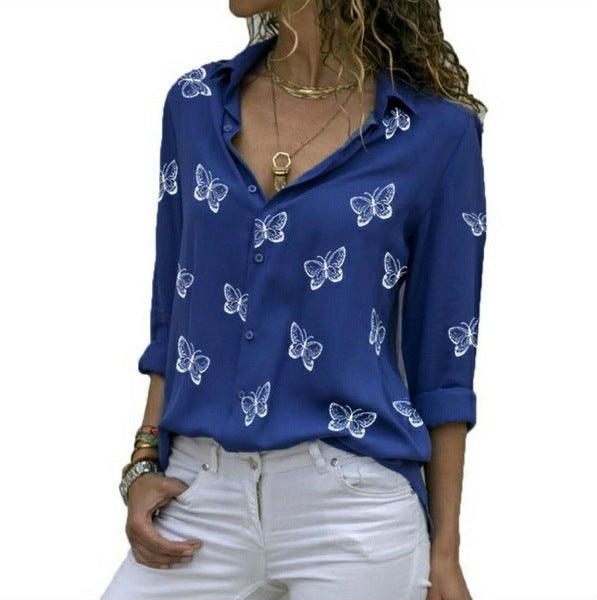 Neleia – Loose blouse with butterfly pattern