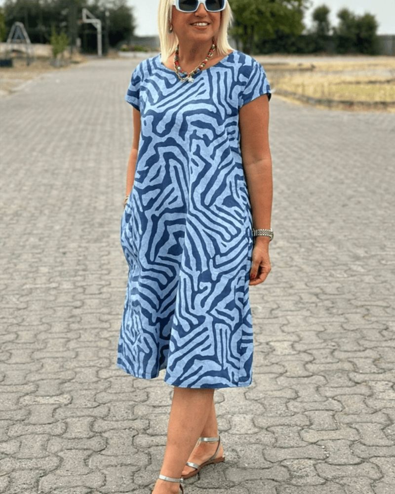 Nelia™ - Vintage dress with a round neckline and beautiful pattern