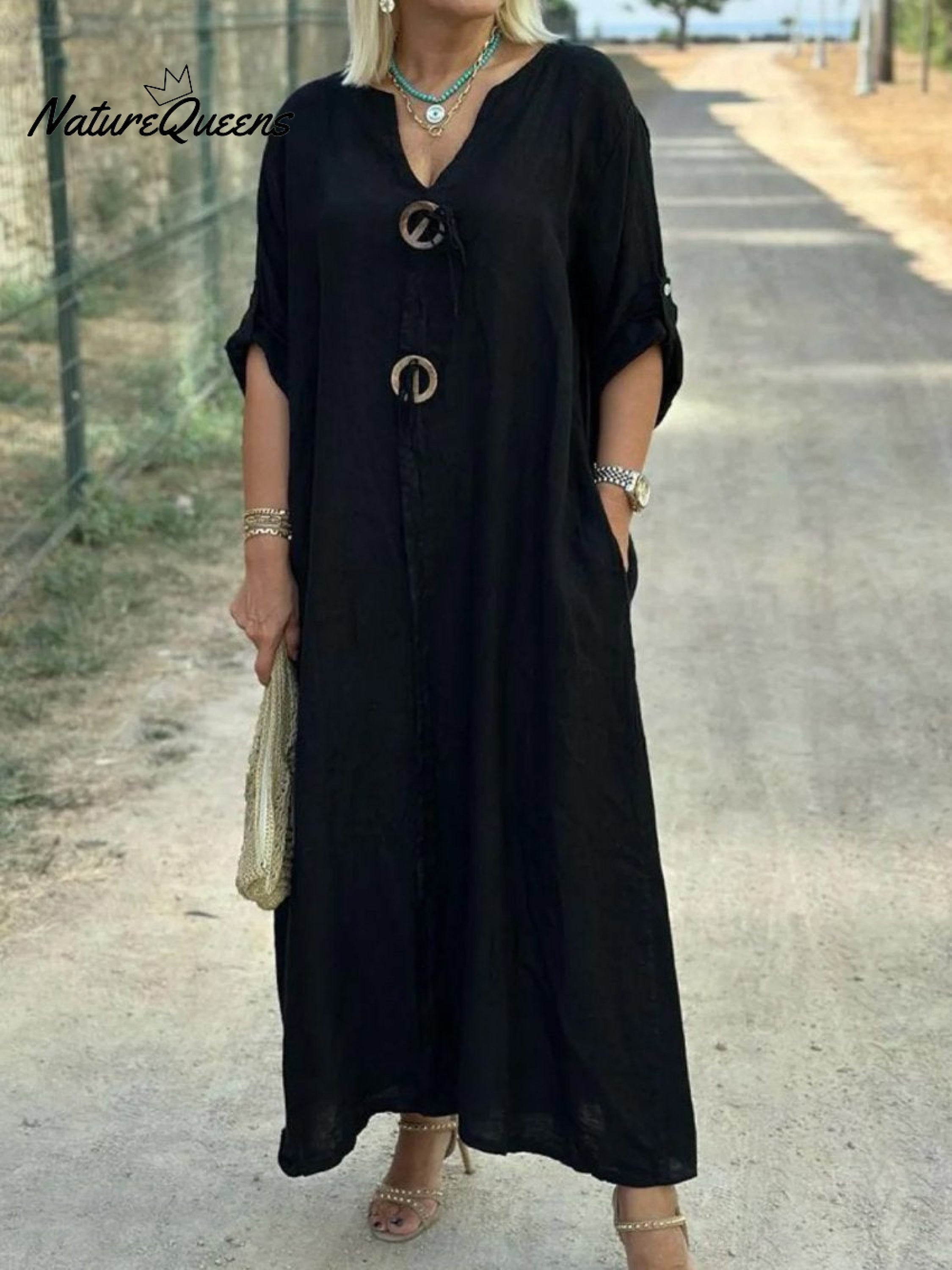 Noor – Long dress with wooden details and wide sleeves
